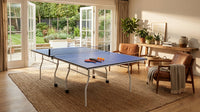 9 Ft. Mid Size Foldable Table Tennis Table Set with Net, 2 Table Tennis Paddles and 3 Balls — Lifestyle